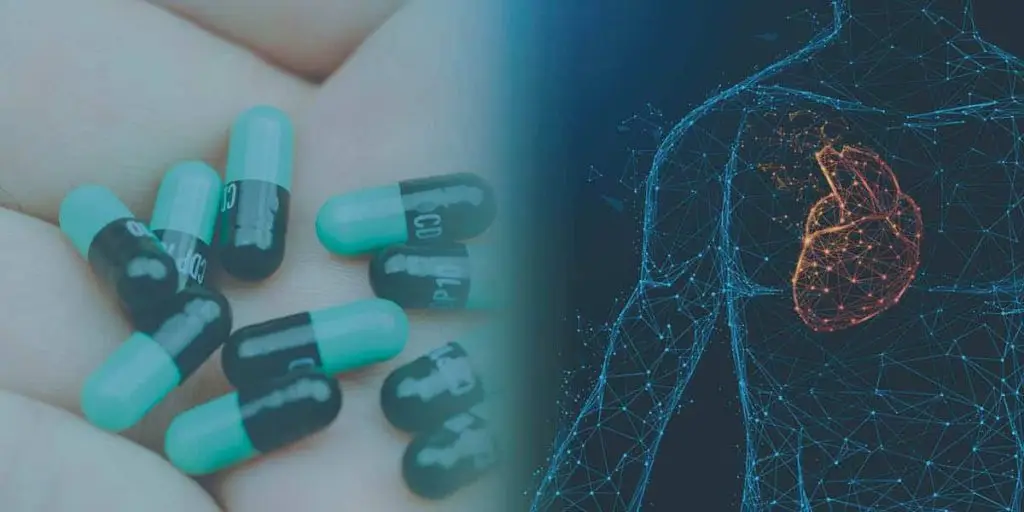 Medication pills next to a heart symbol