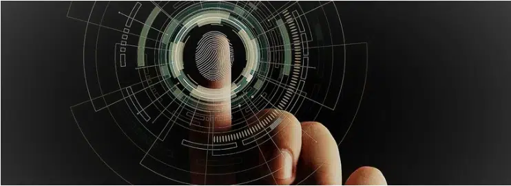 A hand touching a finger on a touch screen, capturing a fingerprint